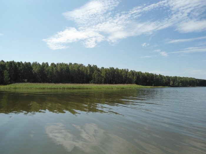 На реке.